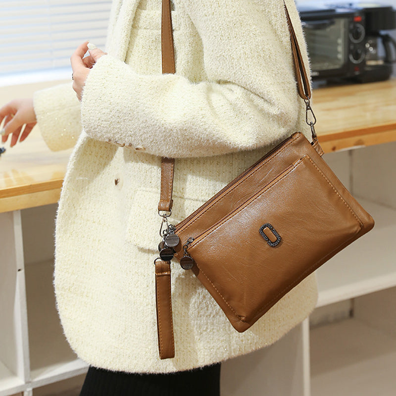 Women's Faux Leather Multi Pocket Crossbody Bag by Juana Fashion
