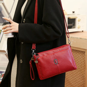 Women's Faux Leather Multi Pocket Crossbody Bag by Juana Fashion