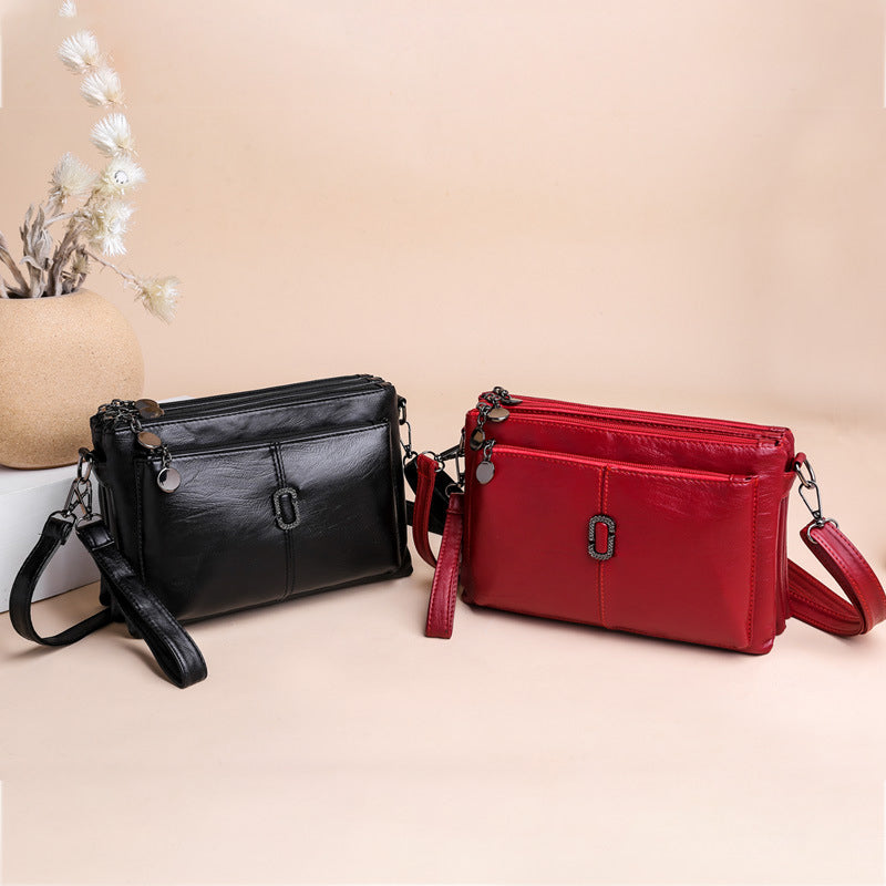 Women's Faux Leather Multi Pocket Crossbody Bag by Juana Fashion