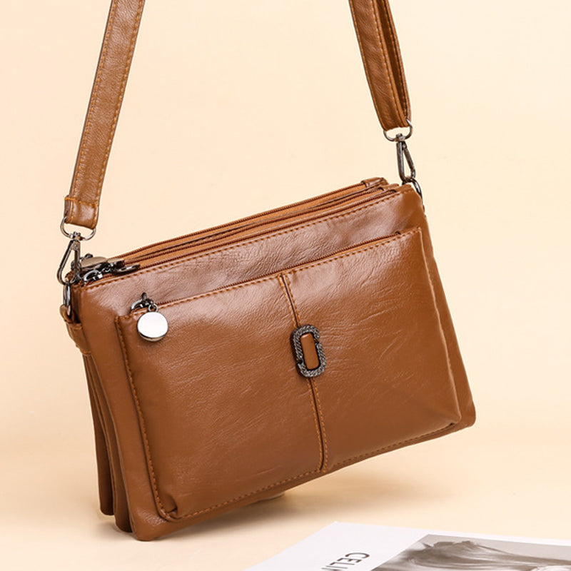 Women's Faux Leather Multi Pocket Crossbody Bag by Juana Fashion