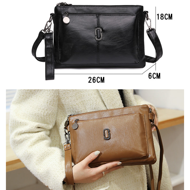 Women's Faux Leather Multi Pocket Crossbody Bag by Juana Fashion