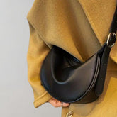 Women's Faux Leather Crescent Crossbody Bag in Black by Juana Fashion