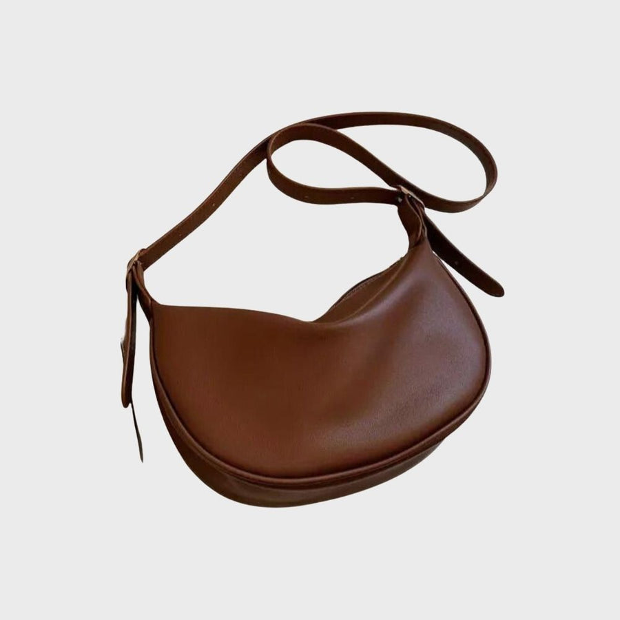 Women's Faux Leather Crescent Crossbody Bag in Brown by Juana Fashion