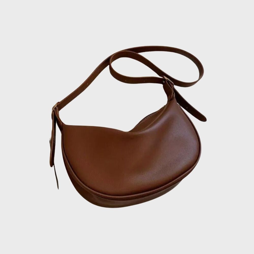 Women's Faux Leather Crescent Crossbody Bag in Brown by Juana Fashion