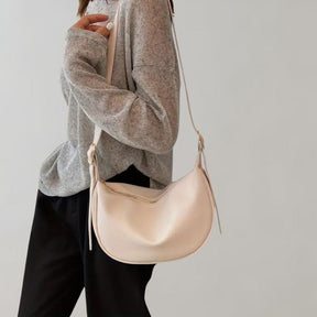 Women's Faux Leather Crescent Crossbody Bag in White by Juana Fashion