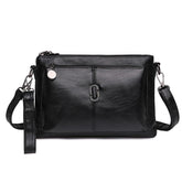 Women's Faux Leather Multi Pocket Crossbody Bag in Black by Juana Fashion
