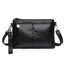 Women's Faux Leather Multi Pocket Crossbody Bag in Black by Juana Fashion