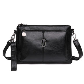 Women's Faux Leather Multi Pocket Crossbody Bag in Black by Juana Fashion