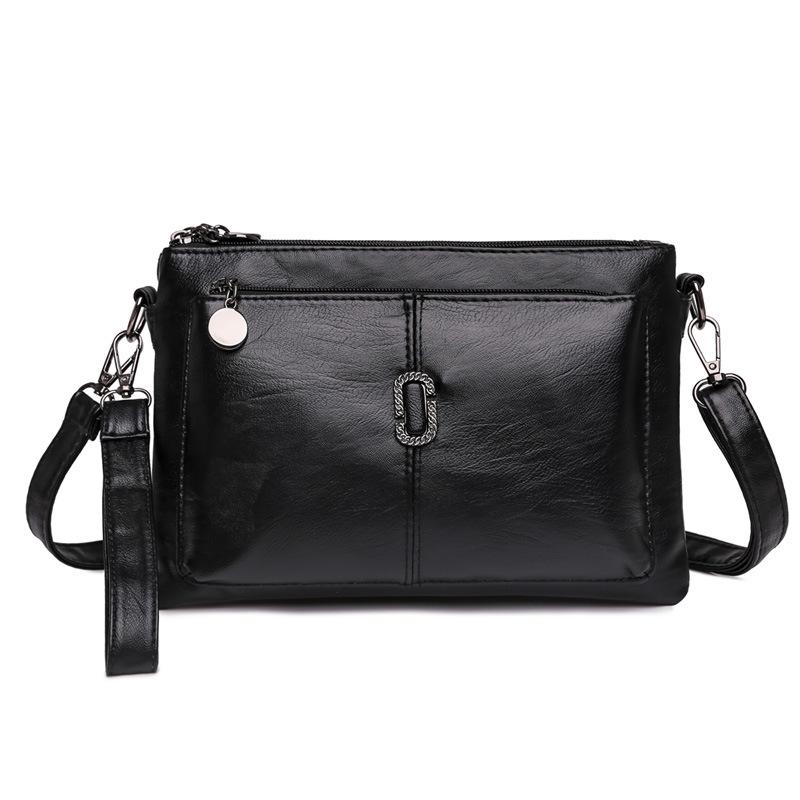 Women's Faux Leather Multi Pocket Crossbody Bag in Black by Juana Fashion