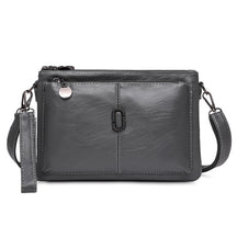 Women's Faux Leather Multi Pocket Crossbody Bag in Gray by Juana Fashion