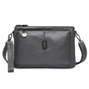 Women's Faux Leather Multi Pocket Crossbody Bag in Gray by Juana Fashion