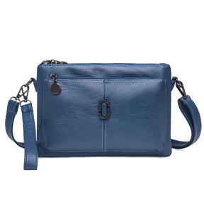 Women's Faux Leather Multi Pocket Crossbody Bag in Blue by Juana Fashion