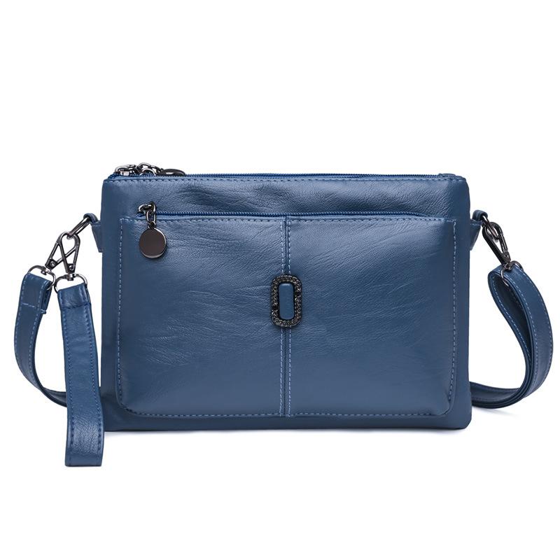 Women's Faux Leather Multi Pocket Crossbody Bag in Blue by Juana Fashion
