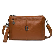 Women's Faux Leather Multi Pocket Crossbody Bag in Brown by Juana Fashion