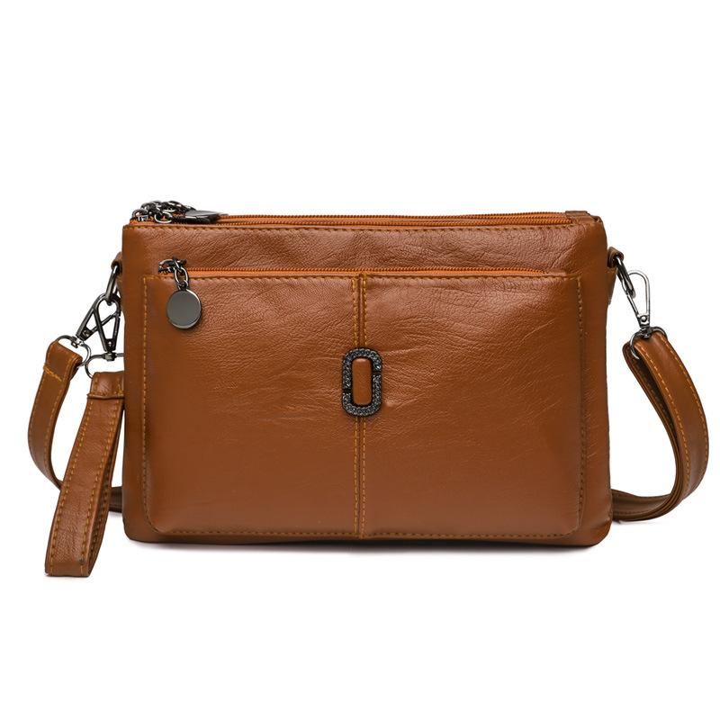 Women's Faux Leather Multi Pocket Crossbody Bag in Brown by Juana Fashion