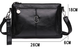 Women's Faux Leather Multi Pocket Crossbody Bag by Juana Fashion