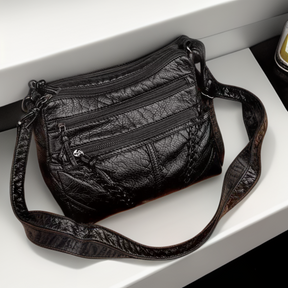 Women's Multi Pocket Braided Crossbody Bag in Black by Juana Fashion