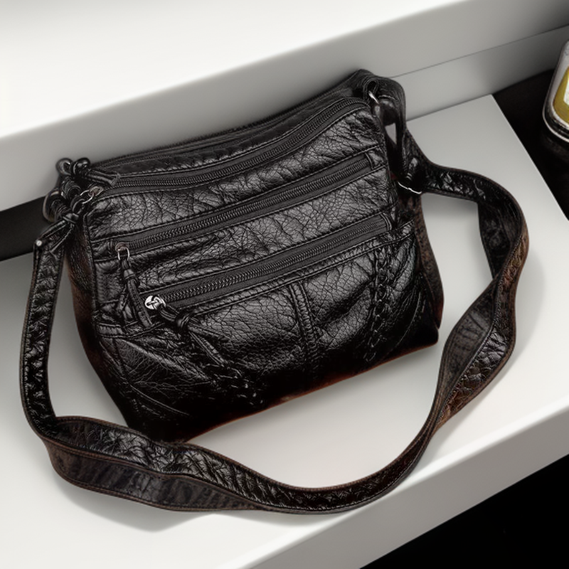 Women's Multi Pocket Braided Crossbody Bag in Black by Juana Fashion